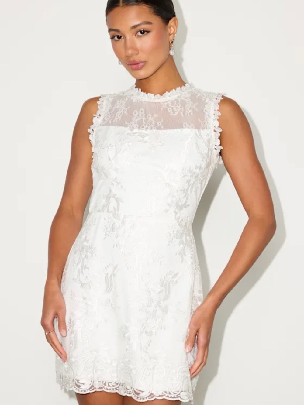 Cirella White Embroidered
Sleeveless Mini Dress